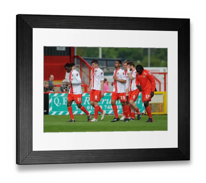 Framed Print : Dejected Stevenage Players: Relegation Confirmed After 1-3 Loss to Bristol City Framed Print : Dejected Stevenage Players: Relegation Confirmed After 1-3 Loss to Bristol City