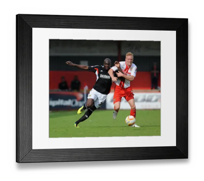 Framed Print : Bristol City vs Stevenage: Nyron Nosworthy vs Jordan Burrow - Intense Battle for Possession