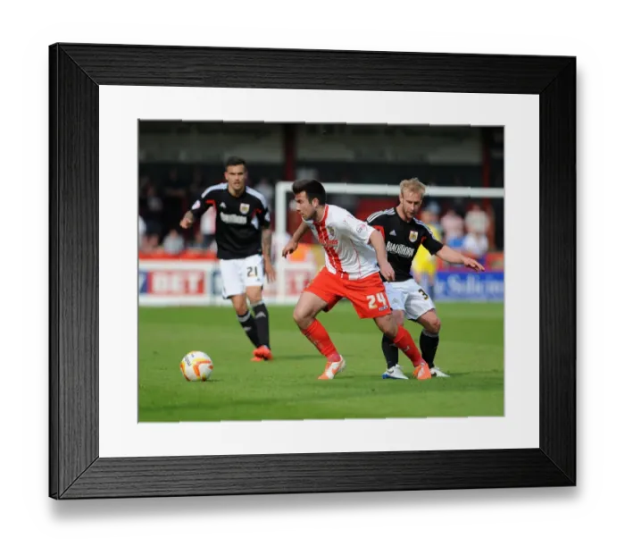 Framed Print : Bristol City's Simon Gillett Closes In on Michael Doughty in Intense Stevenage Showdown Framed Print : Bristol City's Simon Gillett Closes In on Michael Doughty in Intense Stevenage Showdown