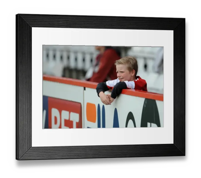 Framed Print : Thrilling Moment: Young Bristol City Fan's Expressive Reaction at Stevenage Match, April 2014