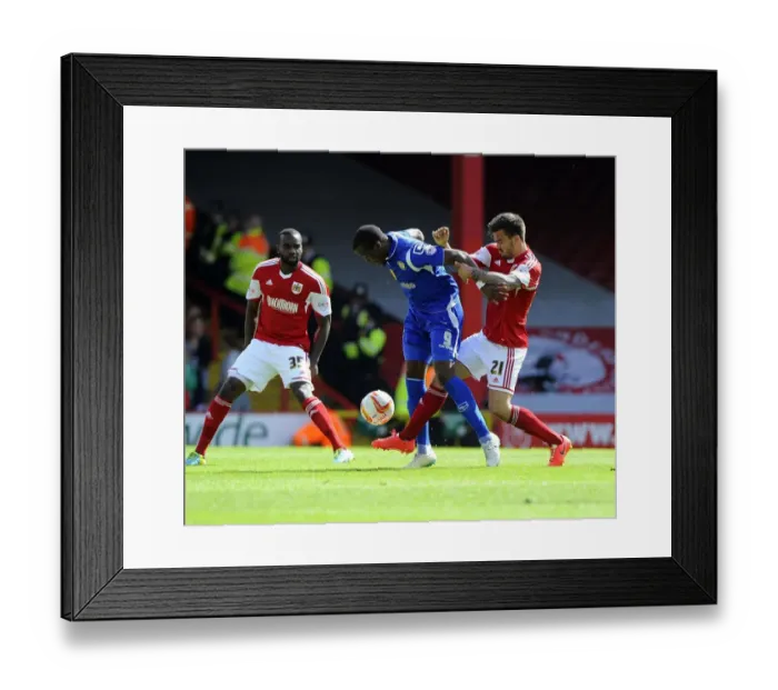 Framed Print : Maron Pack vs. Mathias Pogba: Intense Battle for the Ball in Bristol City vs. Crewe Football Match, 2014