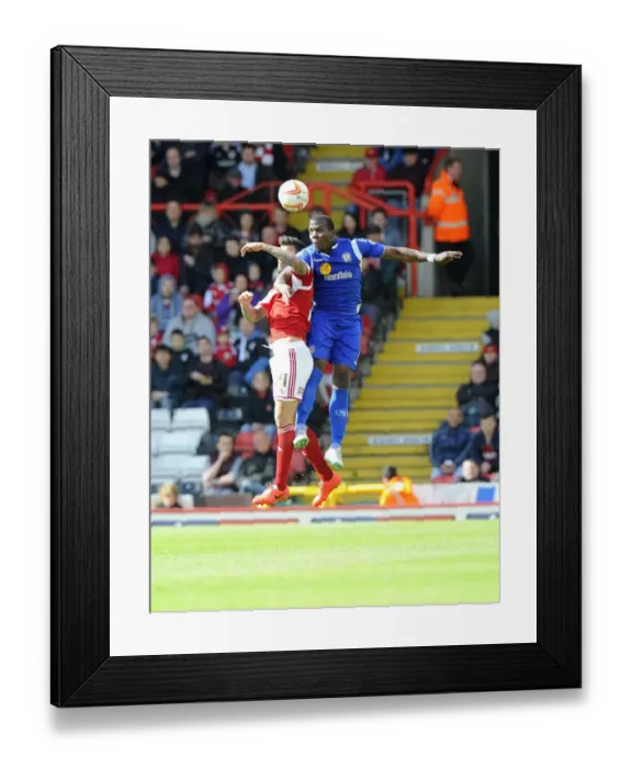 Framed Print : Maron Pack vs. Mathias Pogba: Intense Aerial Battle at Ashton Gate, Bristol City vs. Crewe, 2014