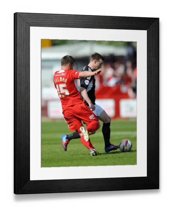Framed Print : Wade Elliott Holds Firmly Against Crawley Town Pressure: A Moment from the Crawley Town vs. Bristol City Football Match, May 3, 2014