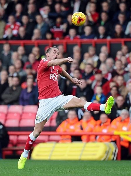 Aaron Wilbraham Reaches for the Ball in Intense Bristol City vs Oldham Athletic Football Match