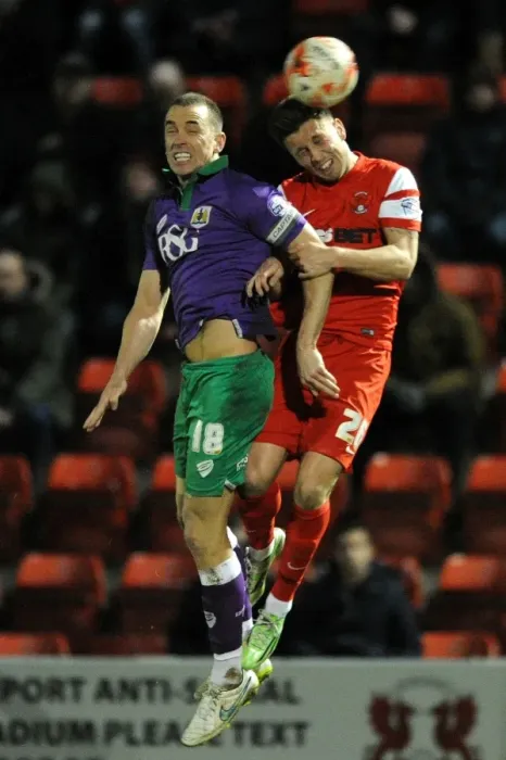 Framed Print : Aaron Wilbraham vs Luke O'Neil: Heading Battle at Brisbane Road, Leyton Orient vs Bristol City, Sky Bet League One