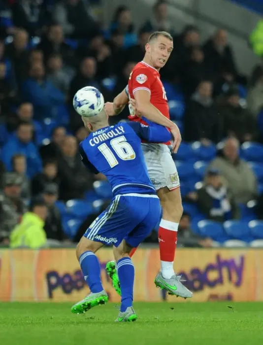 Framed Print : Aaron Wilbraham vs Matthew Connolly: Intense Aerial Battle at Cardiff City Stadium, 2015 Framed Print : Aaron Wilbraham vs Matthew Connolly: Intense Aerial Battle at Cardiff City Stadium, 2015