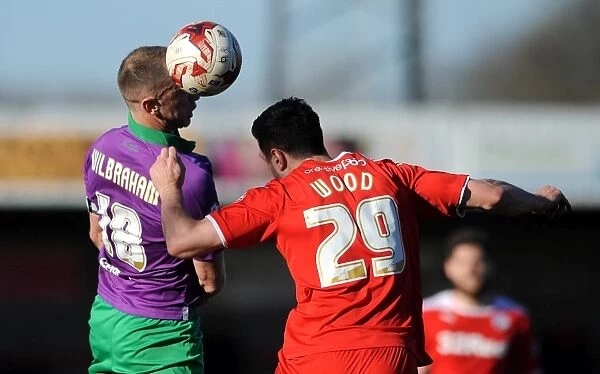 Aaron Wilbraham vs. Richard Wood: Intense Header Battle at Broadfield Stadium - Crawley Town vs. Bristol City, Sky Bet League One