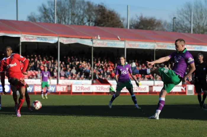 Framed Print : Aaron Wilbraham's Determined Shot: Crawley Town vs. Bristol City, Sky Bet League One