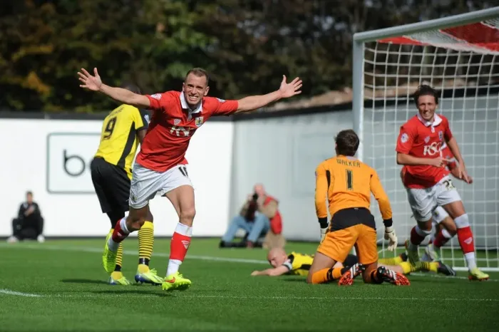 Framed Print : Aaron Wilbraham's Euphoric Goal Celebration: A Memorable Moment at Ashton Gate (Bristol City vs Colchester United, Sky Bet League One, 2014)