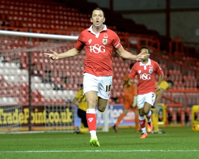 Framed Print : Aaron Wilbraham's Winning Goal Celebration: Bristol City Claims Johnstone's Paint Trophy Victory over AFC Wimbledon