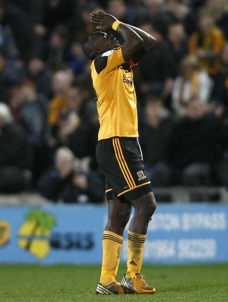 Abdoulaye Faye Contemplates Championship Draw: Hull City vs. Bristol City, 2013