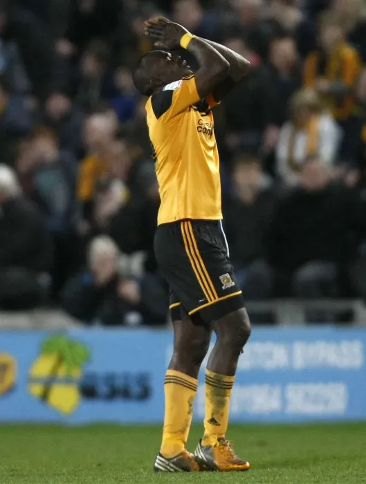 Framed Print : Abdoulaye Faye Contemplates Championship Draw: Hull City vs. Bristol City, 2013
