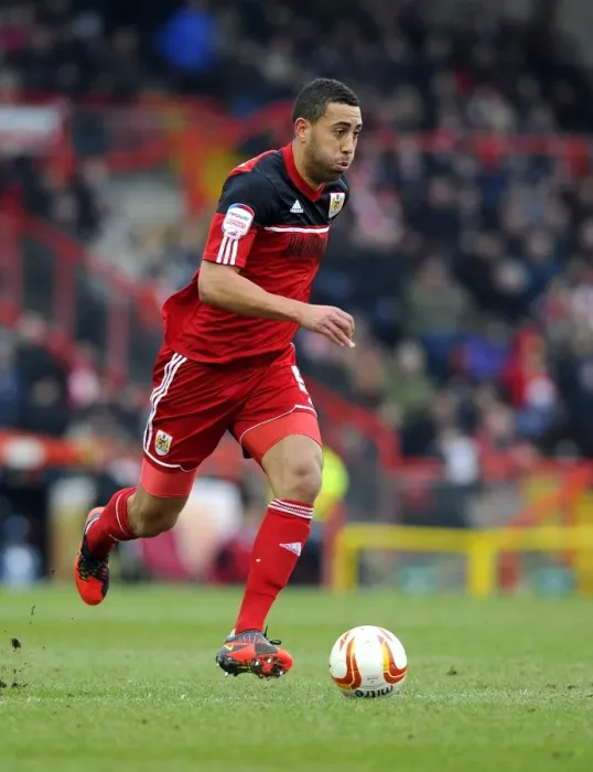 Framed Print : Action-Packed Performance: Lewin Nyatanga's Brilliant Display for Bristol City vs. Sheffield Wednesday (April 2013)