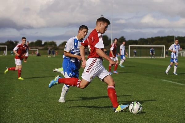 Action-Packed U18 Football: Ben Withey of Bristol City Throttles Forward Against Brighton & Hove Albion