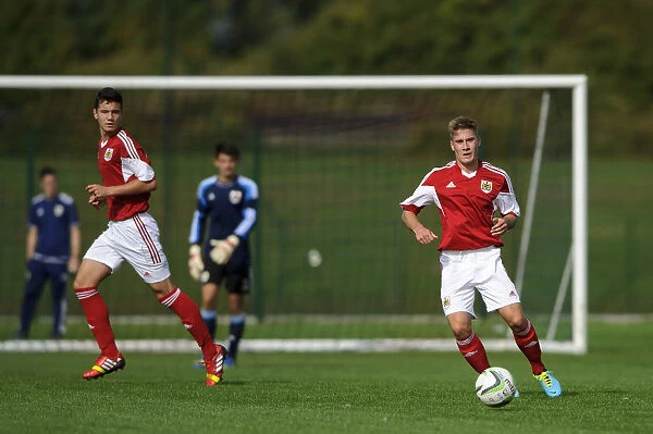 Action-Packed U18 Football: Bristol City's Ben Withey Tackles Forward Against Brighton & Hove Albion