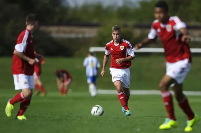 Framed Print : Action-Packed U18 Football: Withey of Bristol City Tackles Forward Against Brighton Framed Print : Action-Packed U18 Football: Withey of Bristol City Tackles Forward Against Brighton