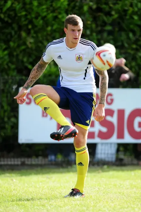 Framed Print : Aden Flint in Action: Bristol City's Pre-Season Friendly Framed Print : Aden Flint in Action: Bristol City's Pre-Season Friendly
