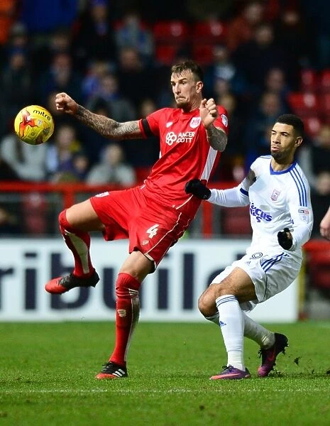 Aden Flint Battles for the Ball: Intense Moment from Bristol City vs Ipswich Town Championship Match