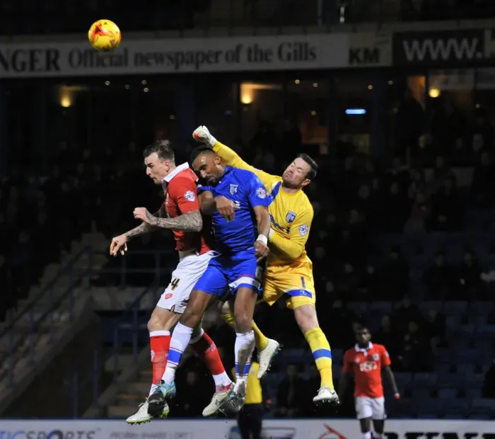 Framed Print : Aden Flint Battles for the Header: Gillingham vs. Bristol City, Johnstone's Paint Trophy Area Final