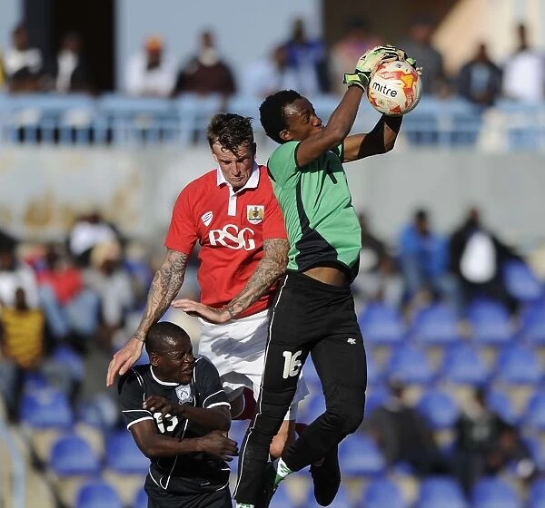 Aden Flint of Bristol City in Action Against Extension Gunners in Botswana, 2014