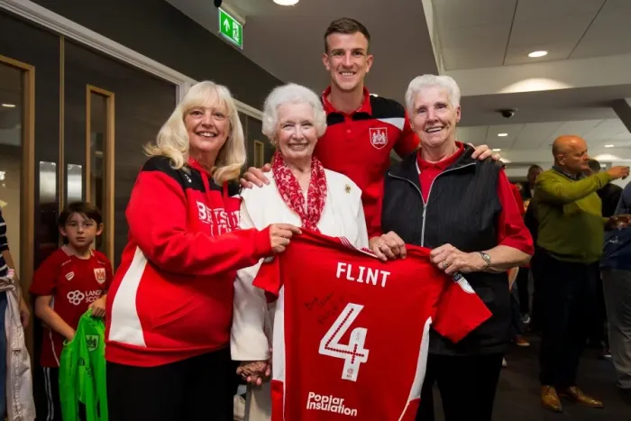 Framed Print : Aden Flint of Bristol City Presents Sponsors with Signed Shirt after Championship Match against Birmingham City