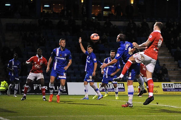 Aden Flint Charges Towards Goal: Gillingham vs. Bristol City, FA Cup Round One