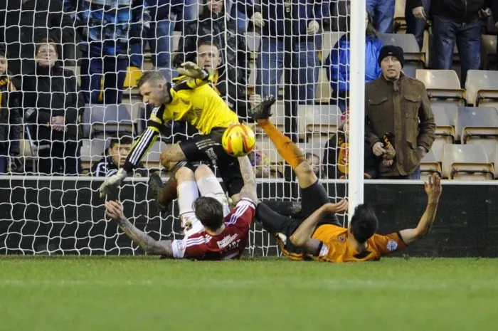 Framed Print : Aden Flint Clears Under Pressure: Wolverhampton Wanderers vs. Bristol City, Sky Bet League One, 2014