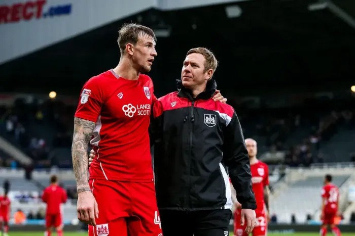 Framed Print : Aden Flint and Dean Holden of Bristol City Discuss 2-2 Draw with Newcastle United at St. James Park