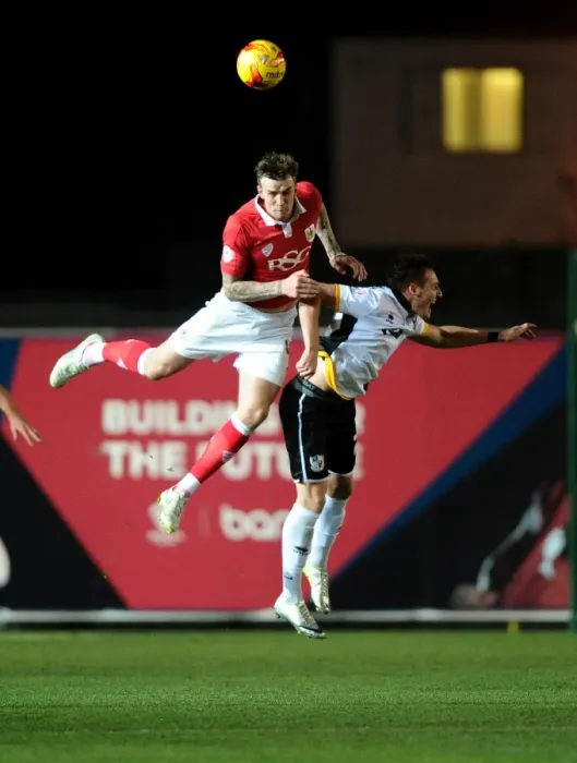 Framed Print : Aden Flint Fights for Supremacy: Bristol City vs Port Vale, Sky Bet League One Framed Print : Aden Flint Fights for Supremacy: Bristol City vs Port Vale, Sky Bet League One
