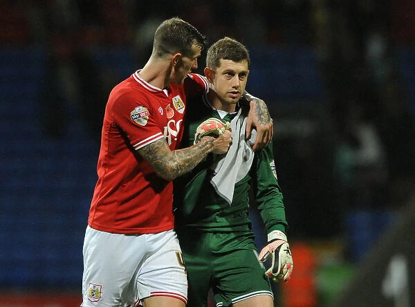 Aden Flint and Frank Fielding Celebrate Bristol City's Victory over Bolton Wanderers, 2015