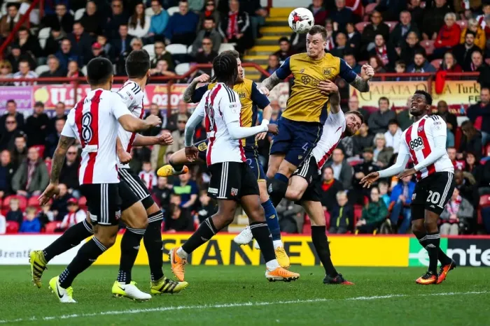 Framed Print : Aden Flint Heads the Ball: Brentford vs. Bristol City Championship Clash, 1st April 2017 Framed Print : Aden Flint Heads the Ball: Brentford vs. Bristol City Championship Clash, 1st April 2017