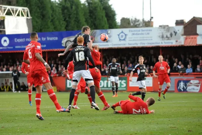 Framed Print : Aden Flint Heads the Ball for Bristol City in FA Cup Second Round Match against Tamworth Framed Print : Aden Flint Heads the Ball for Bristol City in FA Cup Second Round Match against Tamworth
