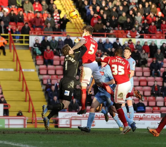 Framed Print : Aden Flint Heads the Ball for Bristol City Against Tranmere Rovers, Sky Bet League One, 2014