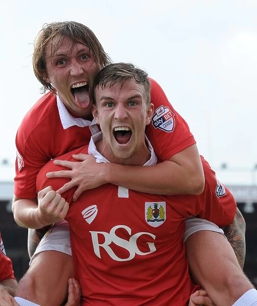 Aden Flint and Luke Ayling Celebrate Goal: Bristol City vs Scunthorpe United, Sky Bet League One, Ashton Gate