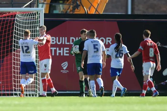 Framed Print : Aden Flint and Sam Clucas Clash in Intense Bristol City vs Chesterfield Rivalry