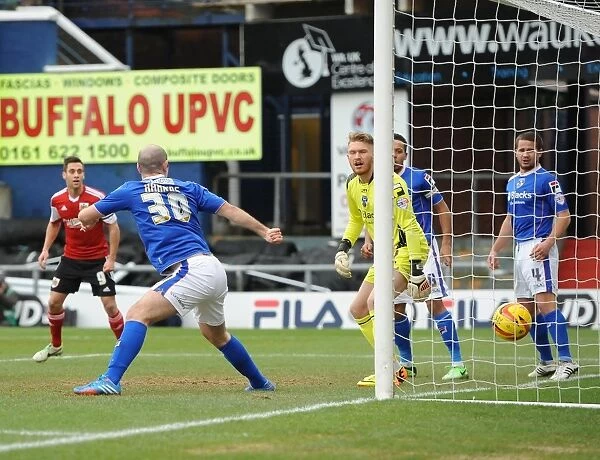 Aden Flint Scores Past Helpless Gary Harkins in Oldham Athletic vs. Bristol City Match