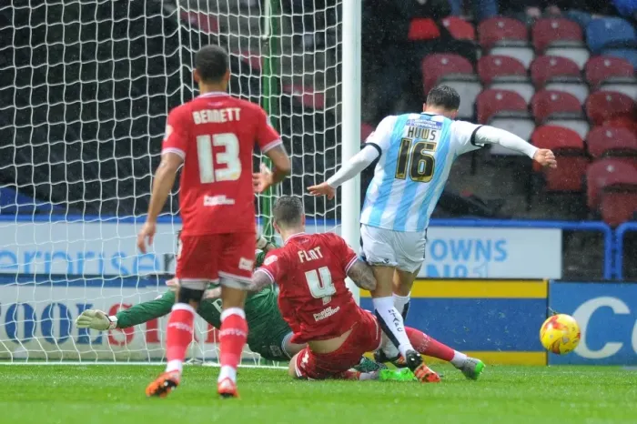 Framed Print : Aden Flint Tackles Emyr Huws in Intense Championship Clash: Huddersfield Town vs. Bristol City Framed Print : Aden Flint Tackles Emyr Huws in Intense Championship Clash: Huddersfield Town vs. Bristol City