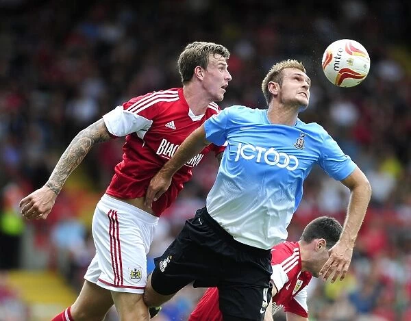 Aden Flint vs. James Hanson: Intense Header Battle at Ashton Gate - Bristol City vs. Bradford City, Sky Bet League One