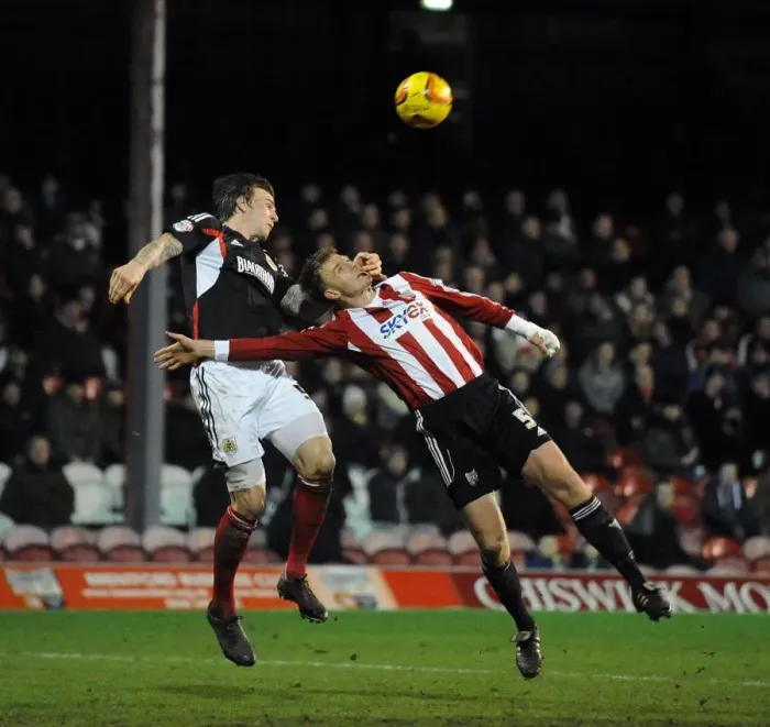 Framed Print : Aden Flint vs. Tony Craig Clash: Brentford vs. Bristol City, Sky Bet League One (January 2014) Framed Print : Aden Flint vs. Tony Craig Clash: Brentford vs. Bristol City, Sky Bet League One (January 2014)