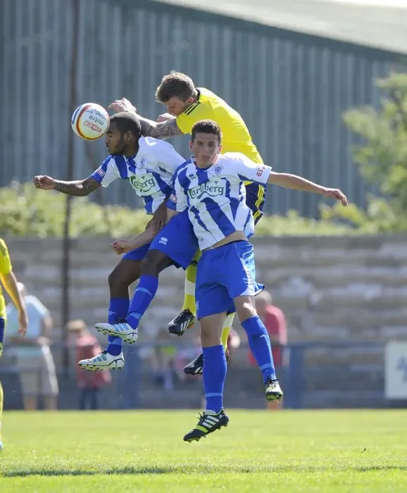 Framed Print : Aden Flint Wins a Header: Bristol City's Pre-Season Victory over Clevedon Town (July 2013) Framed Print : Aden Flint Wins a Header: Bristol City's Pre-Season Victory over Clevedon Town (July 2013)