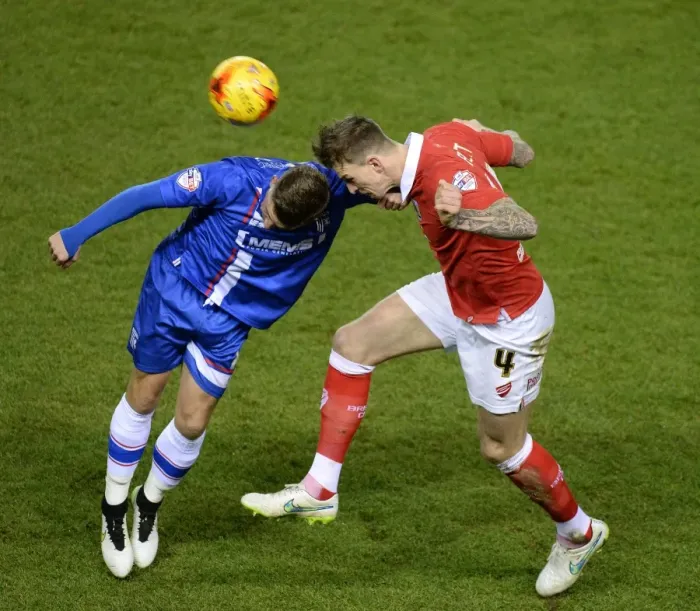 Framed Print : Aden Flint Wins High Ball Against Gillingham's Jake Hessenthaler - Bristol City vs Gillingham, Johnstone's Paint Trophy Southern Area Final