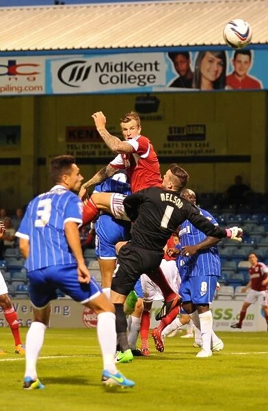 Aden Flint's Close Call: Bristol City's Defender Leaps High but Heads Wide vs. Gillingham