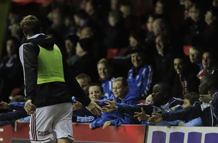 Framed Print : Aden Flint's Euphoric Moment: High-Fiving Fans After Substitution during Bristol City's Victory over Crawley Town Framed Print : Aden Flint's Euphoric Moment: High-Fiving Fans After Substitution during Bristol City's Victory over Crawley Town