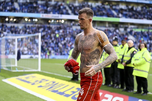 Aden Flint's Generous Gesture: Handing Over His Shirt to a Thrilled Fan at Brighton & Hove Albion vs. Bristol City (April 29, 2017)