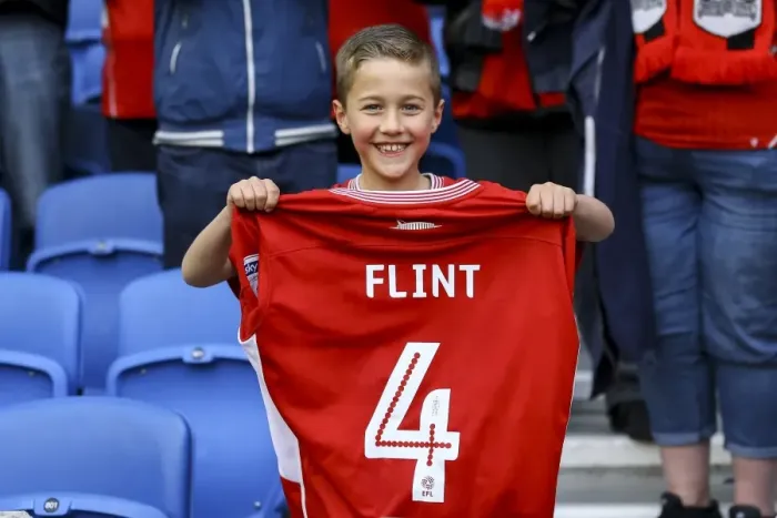 Framed Print : Aden Flint's Generous Moment: Giving Away His Shirt to a Thrilled Fan at Brighton & Hove Albion vs. Bristol City Framed Print : Aden Flint's Generous Moment: Giving Away His Shirt to a Thrilled Fan at Brighton & Hove Albion vs. Bristol City