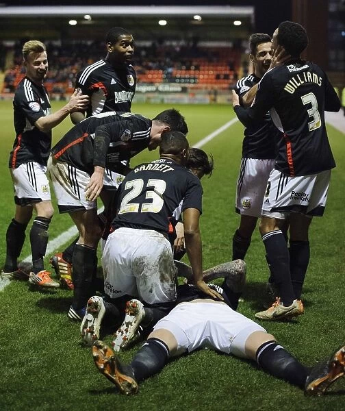 Aden Flint's Triumph: Celebrating Bristol City's Third Goal vs. Leyton Orient, 2014