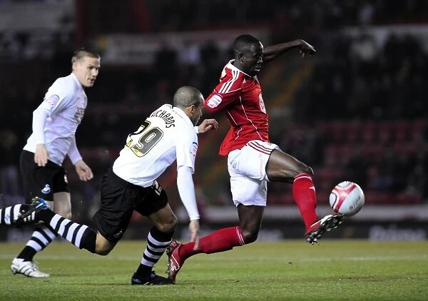 Adomah Breezes Past Richards: Championship Showdown between Bristol City and Swansea City (01 / 02 / 2011)