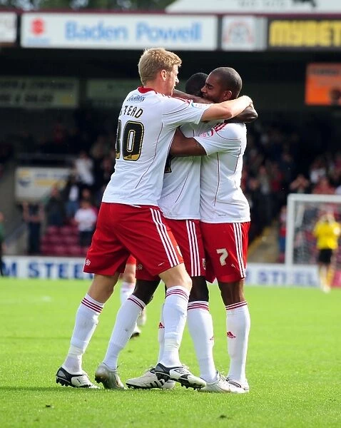 Adomah, Elliott, and Stead: Celebrating a Goal for Bristol City in the Championship Match against Scunthorpe United (September 11, 2010)