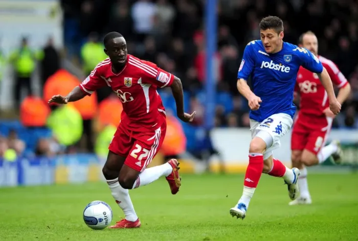 Framed Print : Adomah Evades Ward: Portsmouth vs. Bristol City Football Rumble (17-03-2012) Framed Print : Adomah Evades Ward: Portsmouth vs. Bristol City Football Rumble (17-03-2012)