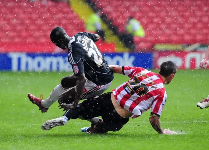 Framed Print : Adomah Fouled by Mattock: Sheffield United vs. Bristol City Championship Clash (23 / 04 / 2011) Framed Print : Adomah Fouled by Mattock: Sheffield United vs. Bristol City Championship Clash (23 / 04 / 2011)